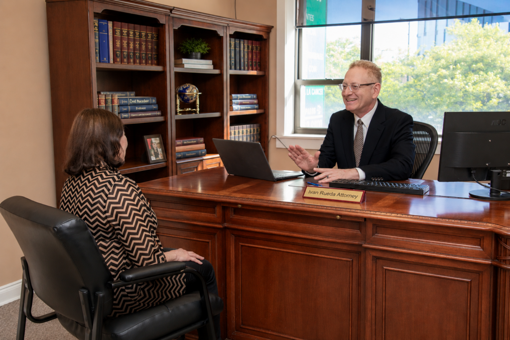 Ivan Rueda meeting with clients